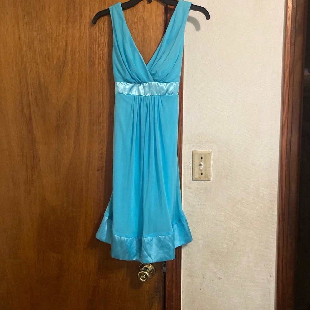 B. Smart light blue dress—-size on dress says 3/4
